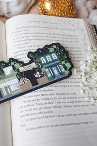 ACOTAR A Walk in Velaris Bookmark is an imagined velaris scene with fake shops like Nesta's bookstore, Elain's community garden (with only flowers in it), Feyre's Art Academy, Rhysand's Tattoo Parlor, and the Suriels Cloak Shop/ Tea Room. Inspired from A Court of Mist and Fury by Sarah J. Maas.