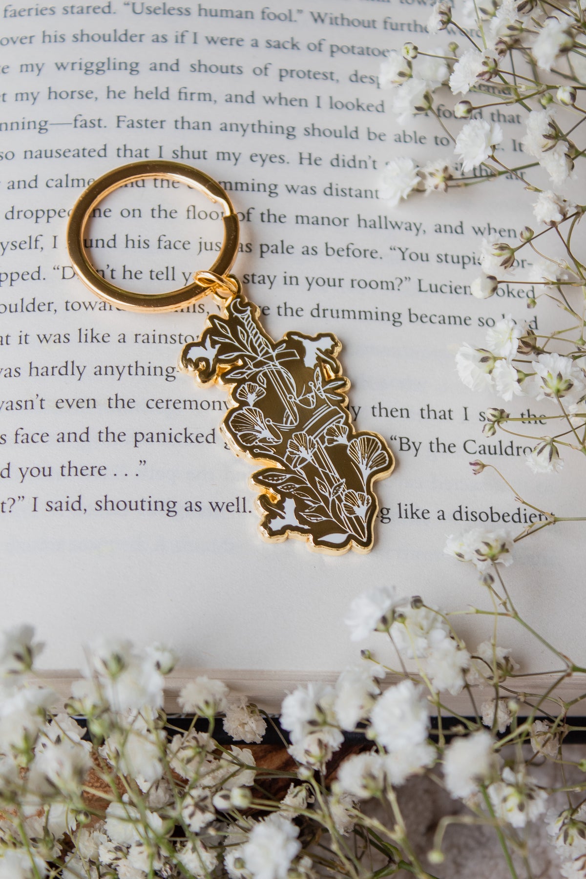 Ivory Swords Metal Keychain