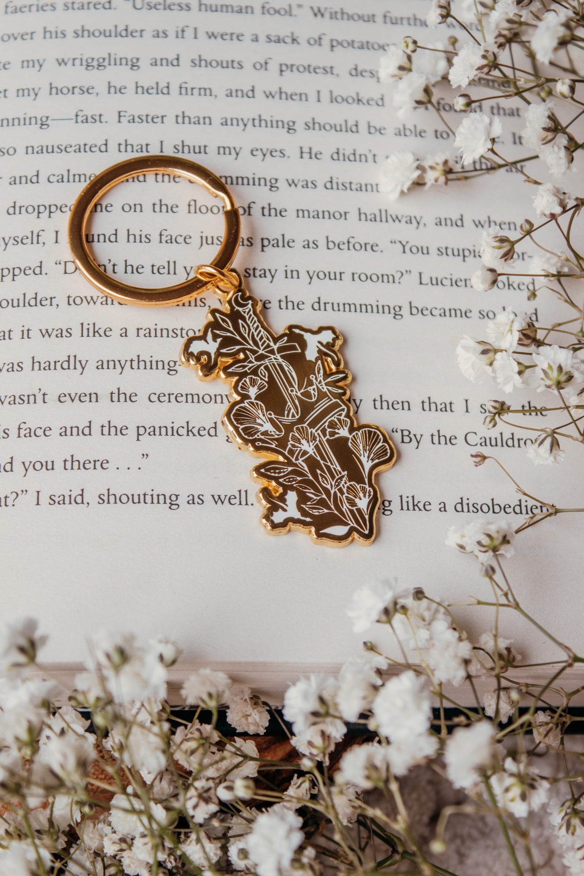 Ivory Swords Metal Keychain