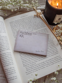 Spark of The Everflame Lumnos Healers Clinic RX Notepad. Inspired by the Kindreds Curse Saga by Penn Cole. This licensed 3"x4" post-it notepad looks like aged parchment, and has "Lumnos Healers Clinic - RX"  and a date line along the top then its signed off by Diem on the bottom corner.
