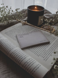 Spark of The Everflame Lumnos Healers Clinic RX Notepad. Inspired by the Kindreds Curse Saga by Penn Cole. This licensed 3"x4" post-it notepad looks like aged parchment, and has "Lumnos Healers Clinic - RX"  and a date line along the top then its signed off by Diem on the bottom corner.