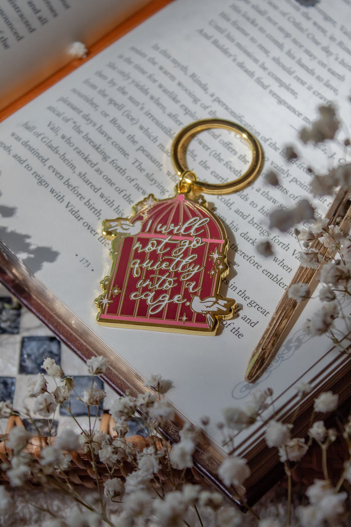 Shield of Sparrows Cage Quote Metal Keychain