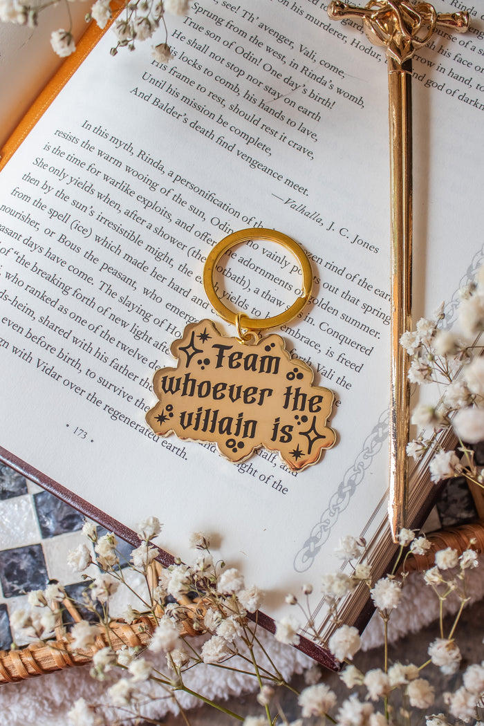 Team Whoever the Villain Is Metal Keychain
