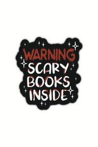 A sticker featuring a black background with the text "Warning: Scary Books Inside" with dripping blood red text for the "warning" and white text with blood drips on them for the others. All on a black background with white stars around it. Sticker shown on a white background. 