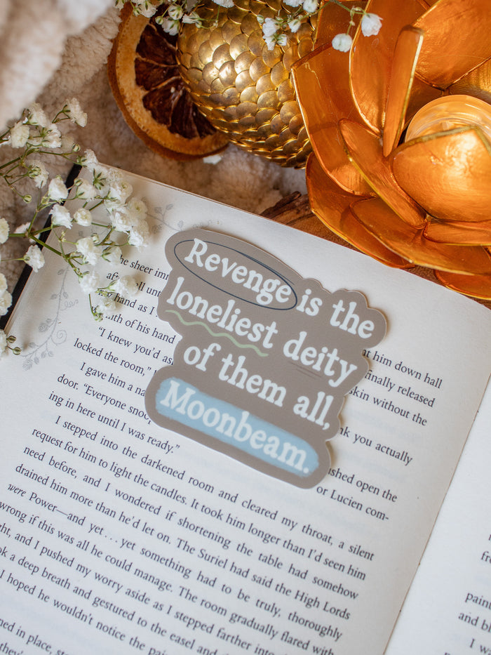 This When the Moon Hatched Quote Sticker from the Moonfall series by Sarah A Parker is a dark taupe with light blue and green annotation style accents around the quote "Revenge is the loneliest deity of them all, Moonbeam"