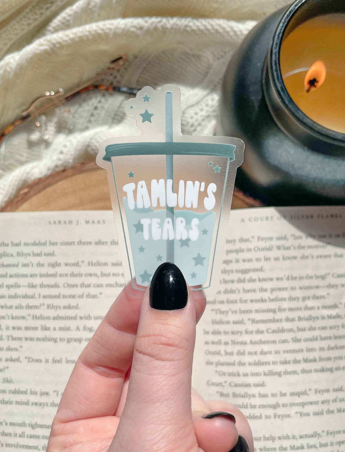 This ACOTAR Tamlin's Tears Tumbler Sticker from A Court of Thorns and Roses by Sarah J Maas is a light blue/ teal tumbler with the text "Tamlin's Tears" in a white bubble font. Transparent Background. 