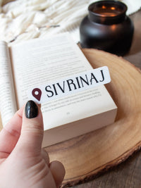 This Sinvrinaj Location Sticker from the Serpent and The Wings of Night by Carissa Broadbent. This Crowns of Nyaxia Bookish Sticker is officially licensed and features a little IG style location marker of the City of Sivrinaj 