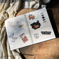 Cozy Bookshelf Reusable Sticker Book | 50 Double Sided Pages